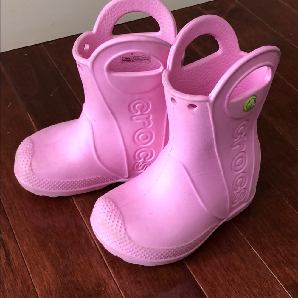 Crocs pink rain boots